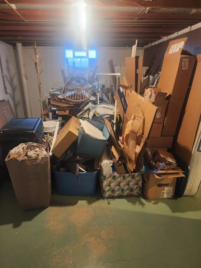 Roll-off dumpster container at job site for 4 Yard Dumpster Rental in Amity